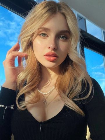 Тая